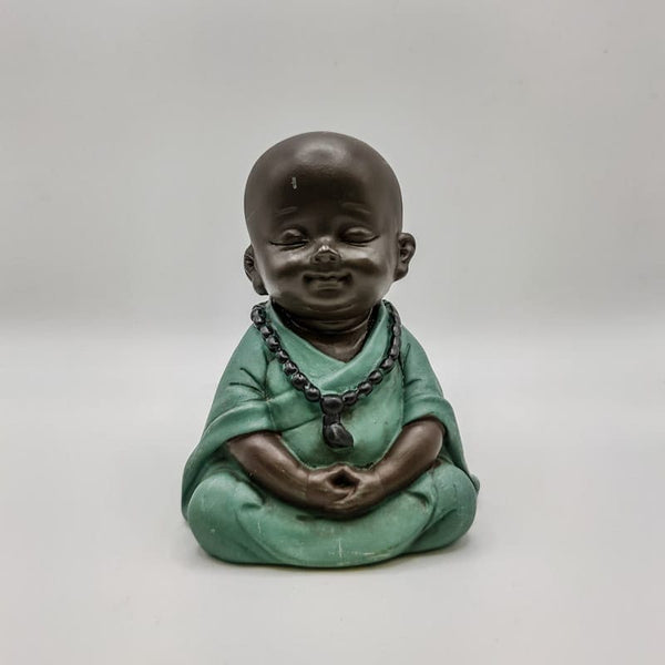 Baby Buda Monge Meditando